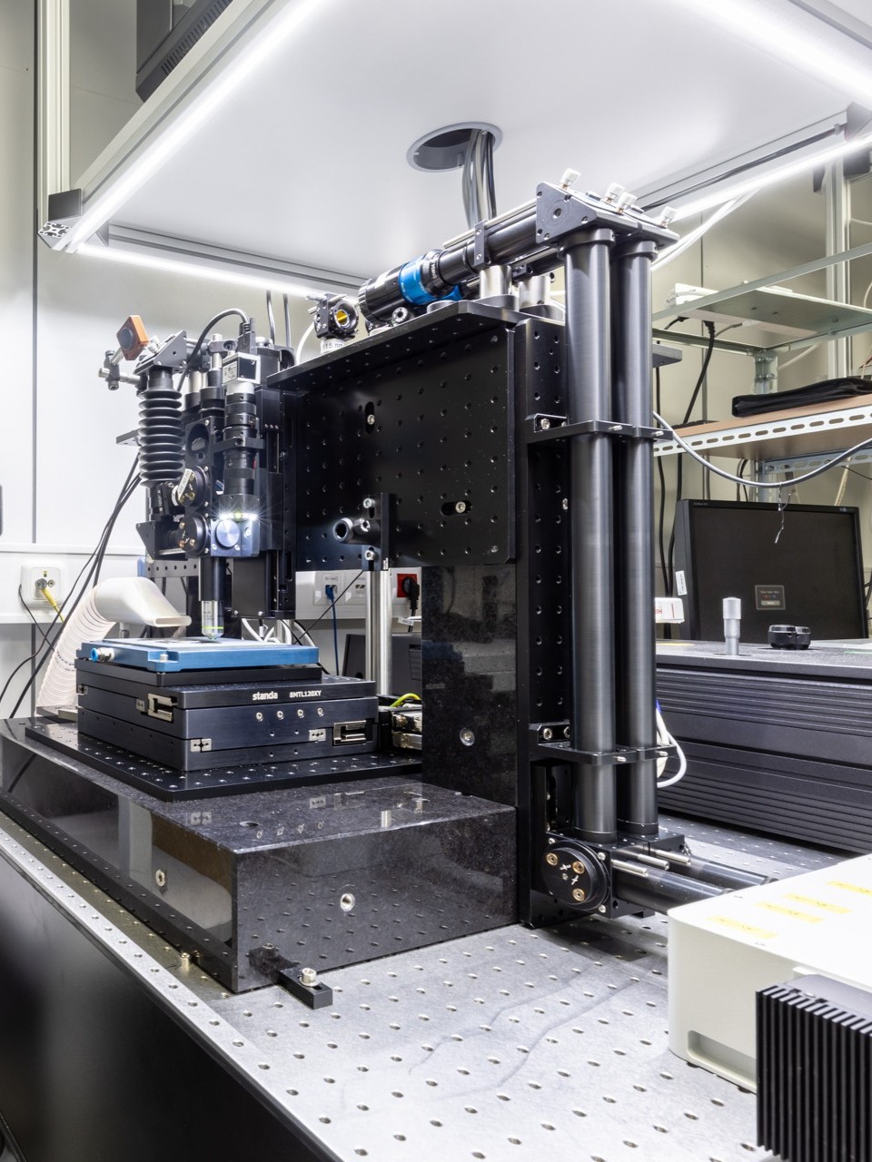 Micromachining station side view with researcher